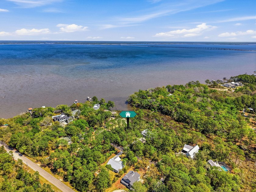 This beautiful waterfront homesite is tucked away in the - photo 26
