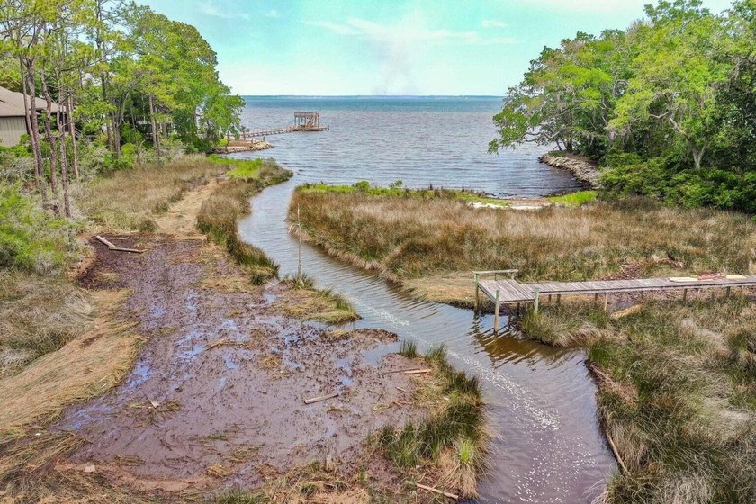 This beautiful waterfront homesite is tucked away in the - photo 32