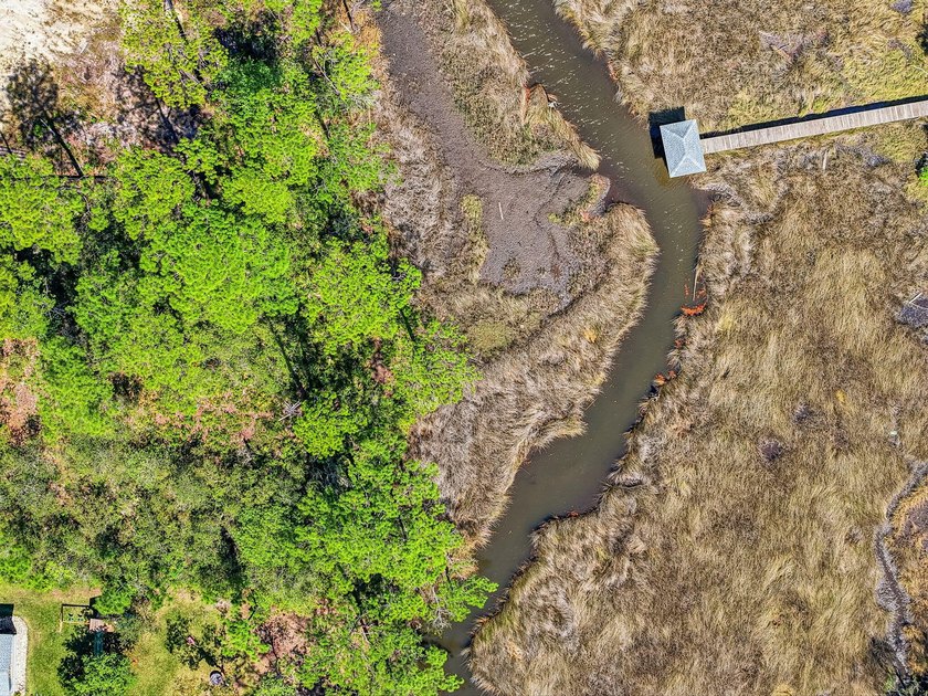 This beautiful waterfront homesite is tucked away in the - photo 35