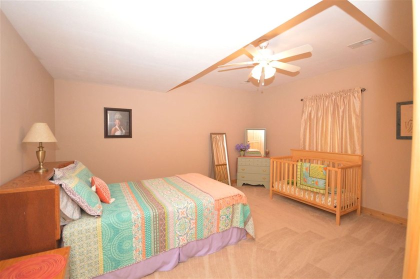 Welcome home to the tranquility of Earl Street! Set on a one - photo 39