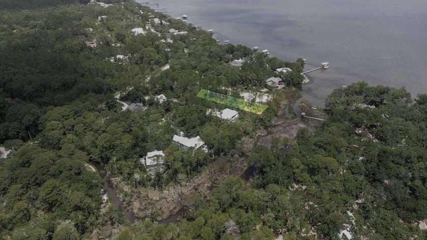 This beautiful waterfront homesite is tucked away in the - photo 41