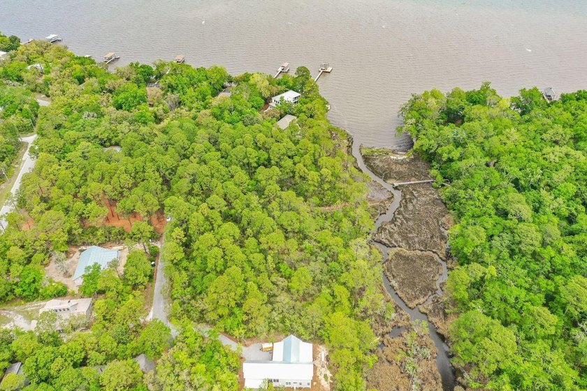 This beautiful waterfront homesite is tucked away in the - photo 42
