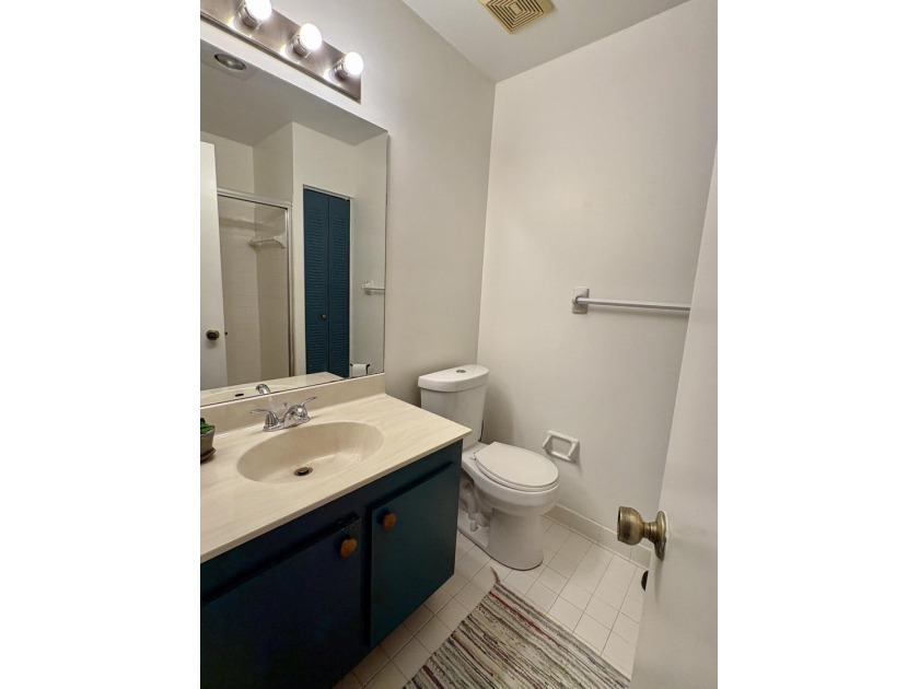 Beautifully updated 2-bedroom, 2-bath second-floor condo located - photo 12