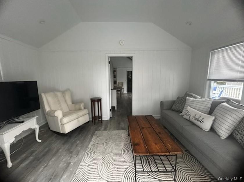 Tucked away on a private .72-acre flag lot, this cozy 2-bedroom - photo 3