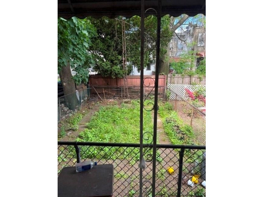 Beautiful 2-family attached brick home with a massive footprint - photo 8