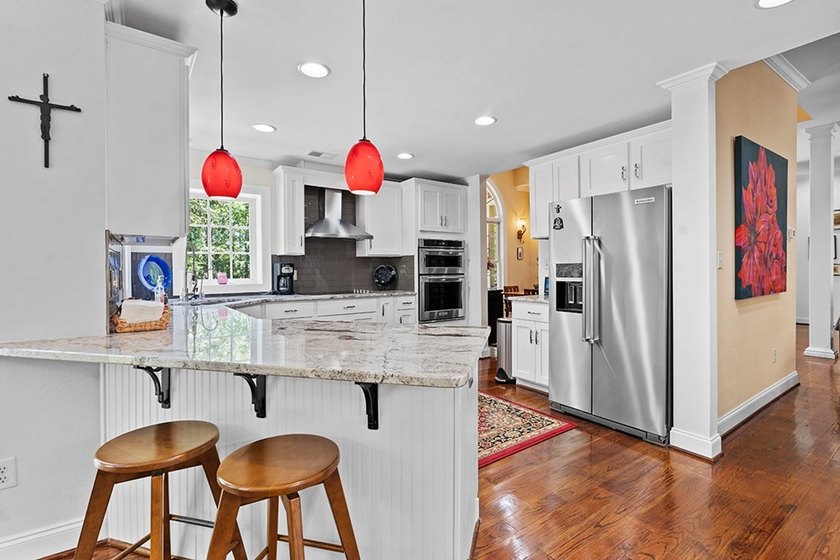 This exquisite Grand Harbor home makes a stunning first - photo 11