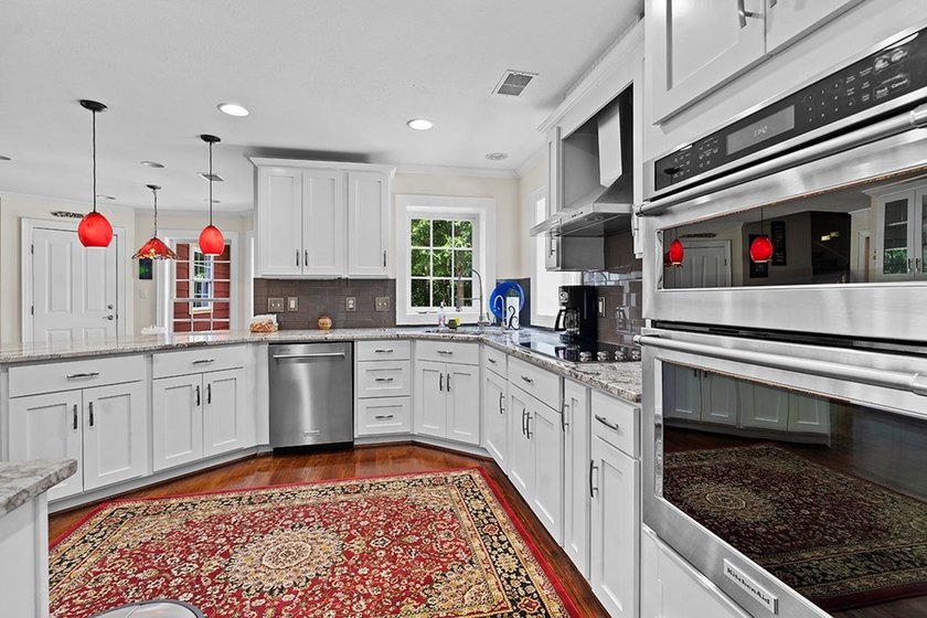 This exquisite Grand Harbor home makes a stunning first - photo 12