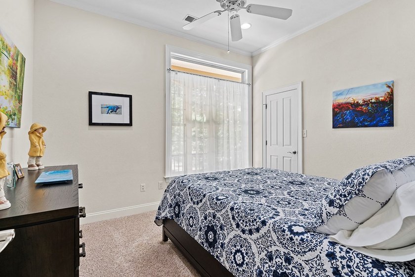 This exquisite Grand Harbor home makes a stunning first - photo 19