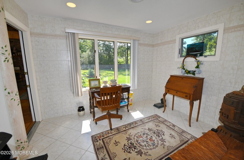 Welcome to this sprawling ranch tucked away on a tree-lined - photo 21