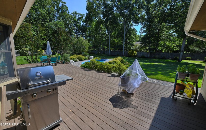 Welcome to this sprawling ranch tucked away on a tree-lined - photo 35