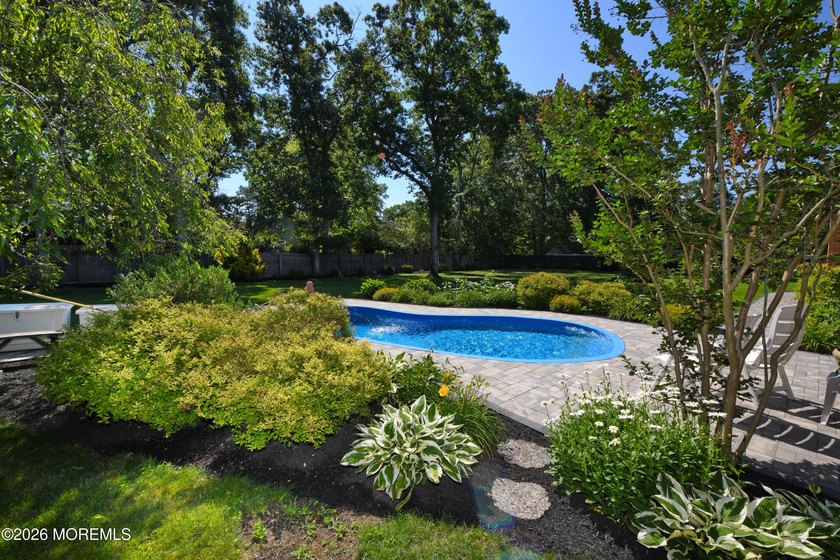 Welcome to this sprawling ranch tucked away on a tree-lined - photo 38