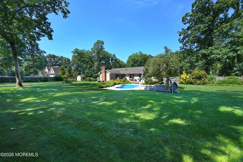 Welcome to this sprawling ranch tucked away on a tree-lined - photo 43