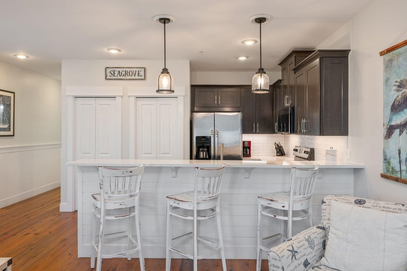 THE PERFECT BEACH CONDO, PRICE IMPROVEMENT! Located in the heart - photo 5