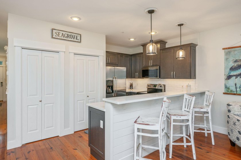 THE PERFECT BEACH CONDO, PRICE IMPROVEMENT! Located in the heart - photo 6