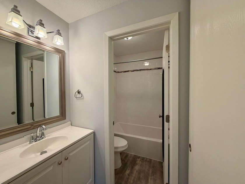 Enjoy comfortable condo living in this top-level unit offering a - photo 13