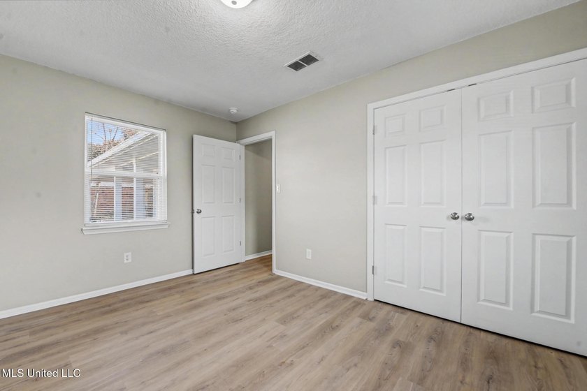 Freshly renovated and move-in ready 3-bedroom, 2-bath home - photo 16