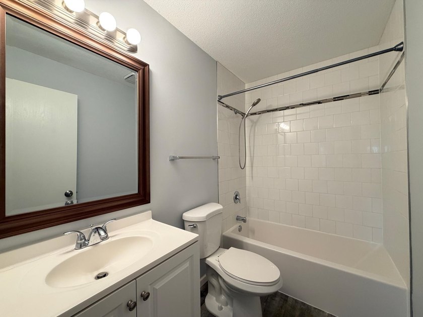 Enjoy comfortable condo living in this top-level unit offering a - photo 17