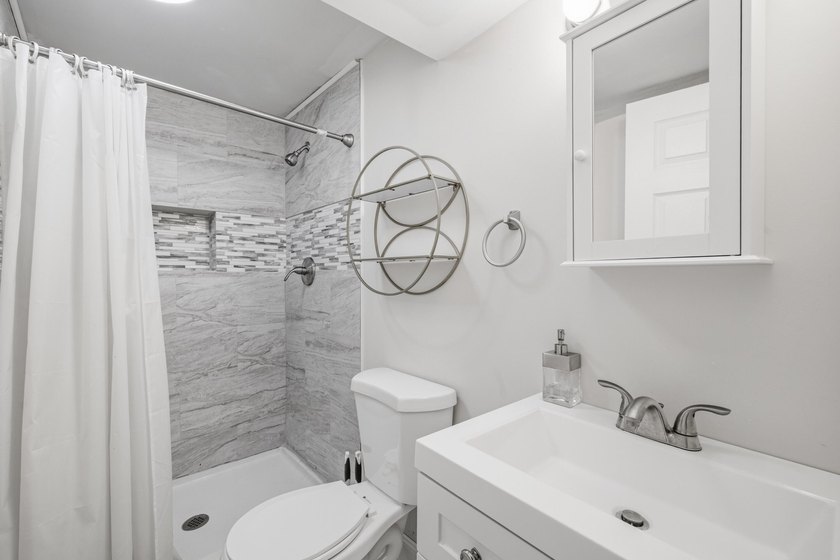 Perfectly positioned a mile from downtown Lake Geneva, this home - photo 19