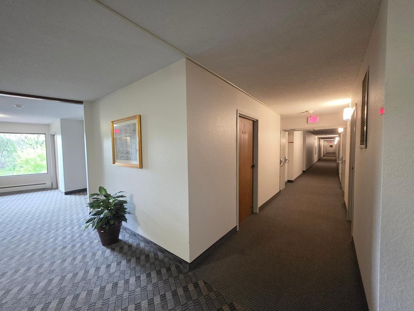 Enjoy comfortable condo living in this top-level unit offering a - photo 27
