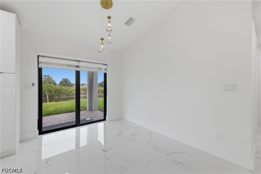Welcome to this true gem that perfectly blends luxury with - photo 13