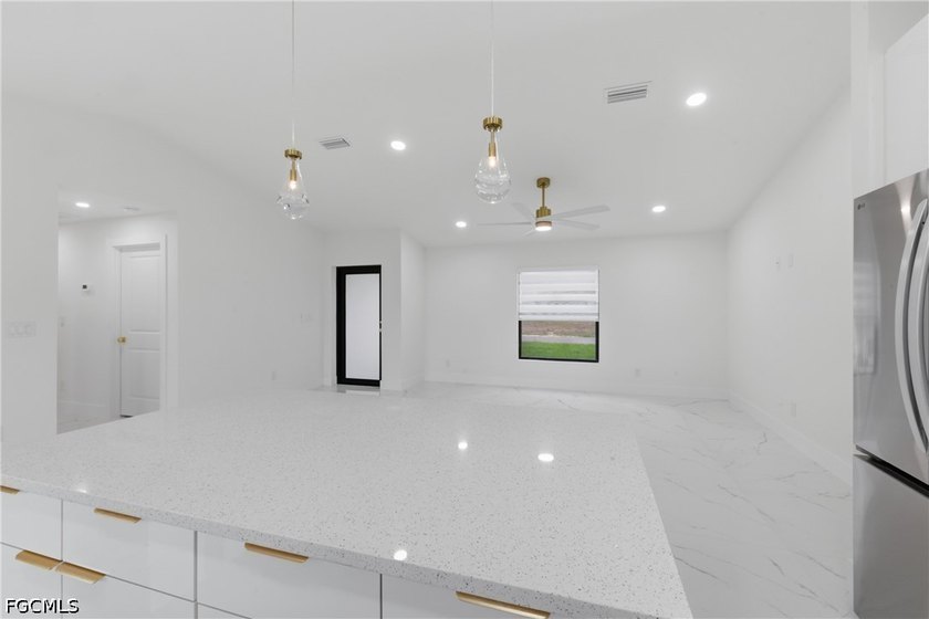 Welcome to this true gem that perfectly blends luxury with - photo 14
