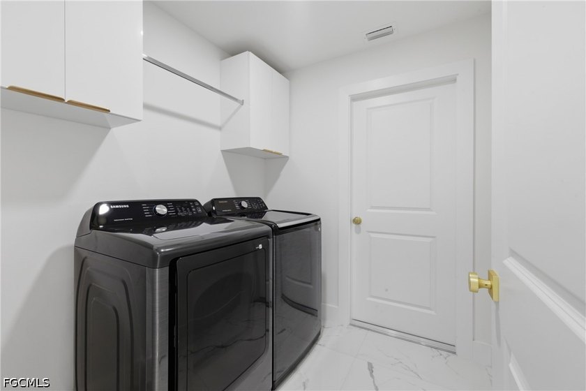 Welcome to this true gem that perfectly blends luxury with - photo 15