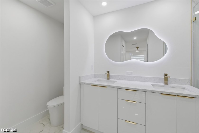 Welcome to this true gem that perfectly blends luxury with - photo 26