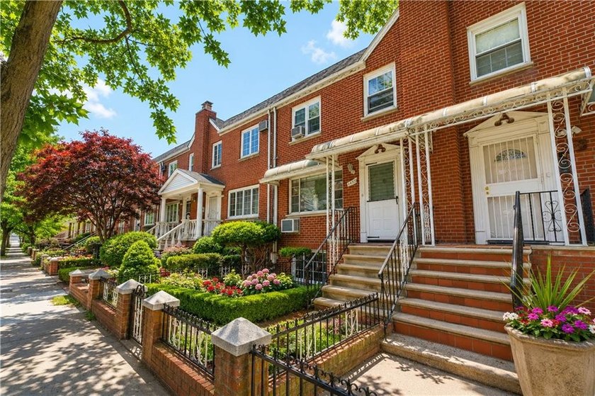 Welcoming a brick 2-family home, situated in a very desirable - photo 3
