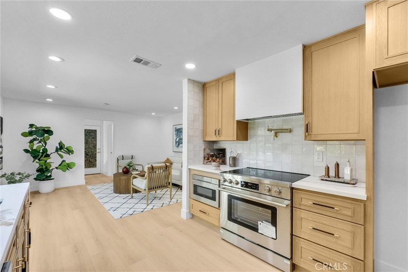 Beautifully remodeled 5-bedroom home with a sought-after - photo 12