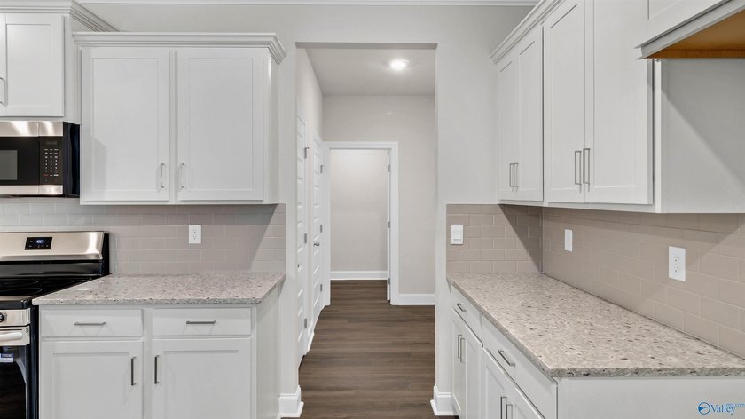 **HOME IS UNDER 48 HR FROR**This stunning residence features 4 - photo 14