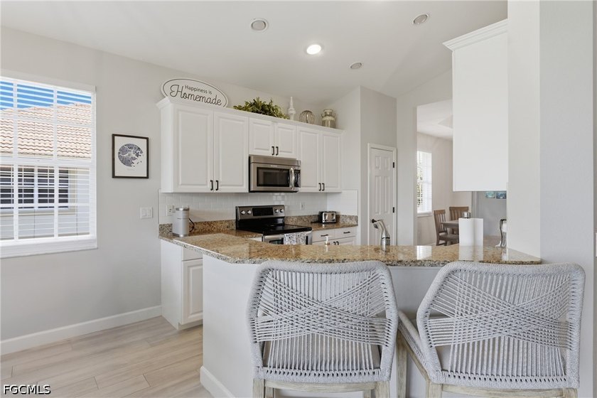 Welcome to this beautiful 3-bedroom, 2-bath residence in the - photo 11