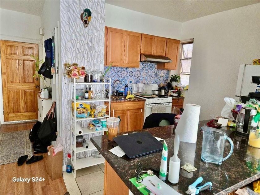 Introducing this well maintained six-family solid brick building - photo 8