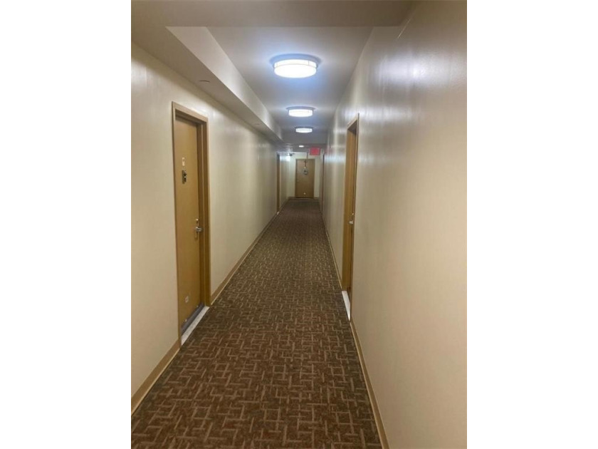 This unit is part of the lovely Aurora Condominium which boasts - photo 4
