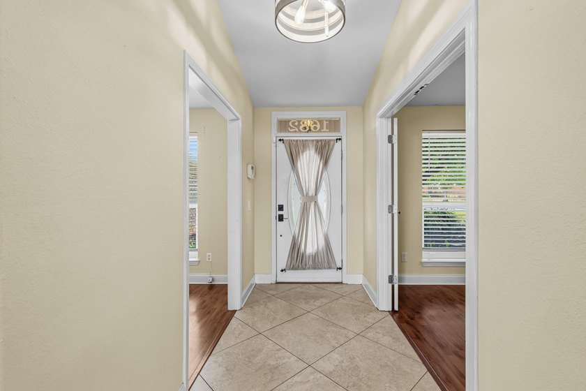 Welcome home to your slice of paradise! This beautiful brick - photo 5