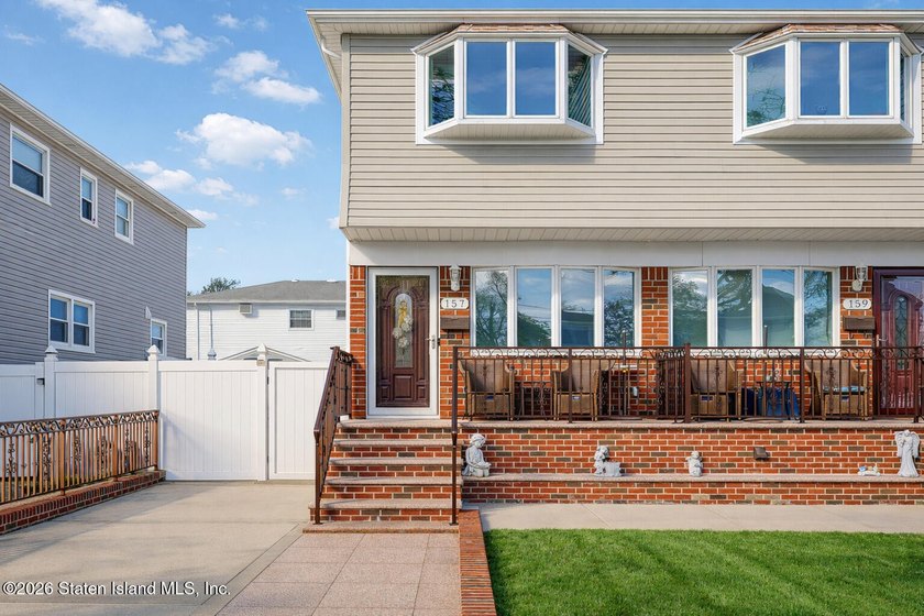This meticulously maintained semi-attached home is ready to - photo 3