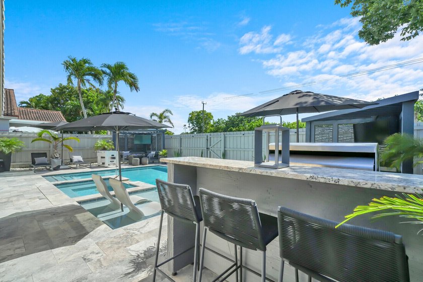 Welcome to this stunning 4-bedroom, 2-bathroom residence - photo 20