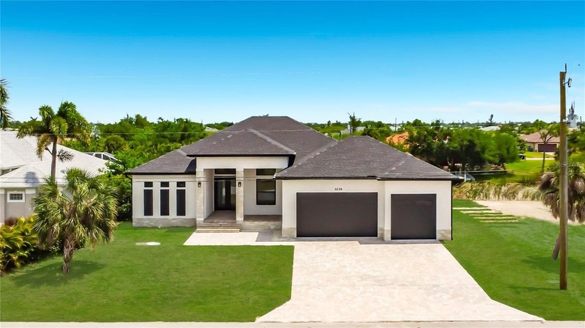 BRAND NEW WATERFRONT MASTERPIECE WITH GULF ACCESS. Welcome to - photo 3