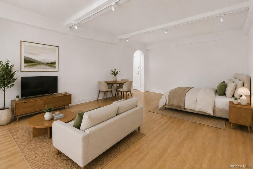 Welcome home to this beautifully renovated studio co-op in the - photo 3