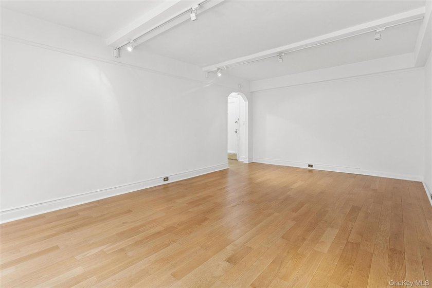 Welcome home to this beautifully renovated studio co-op in the - photo 4