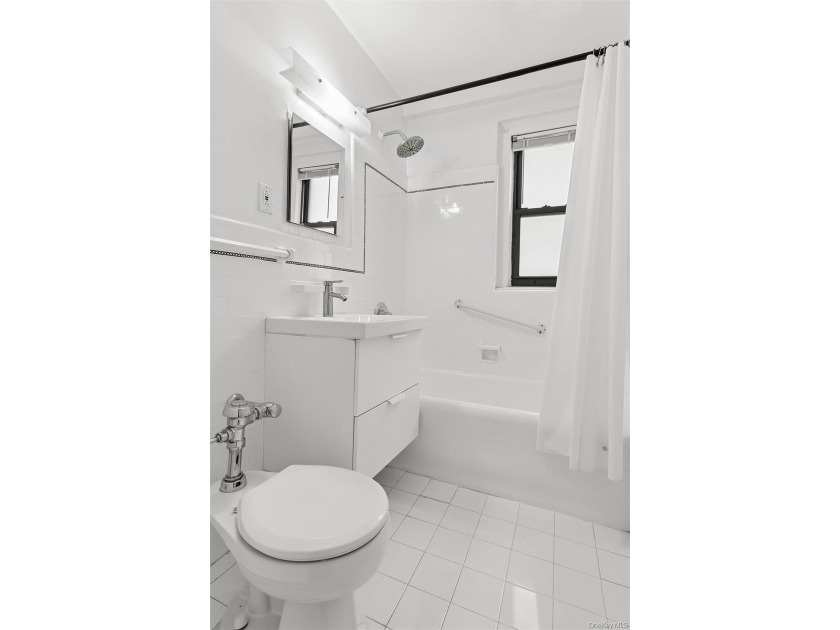 Welcome home to this beautifully renovated studio co-op in the - photo 8