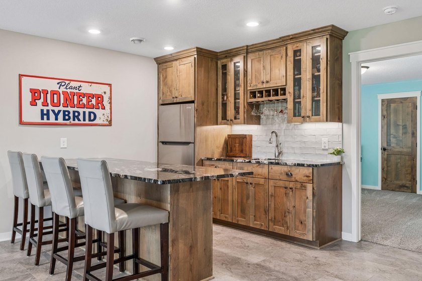 Formerly a Lang Builders model home, this exceptional rambler - photo 39