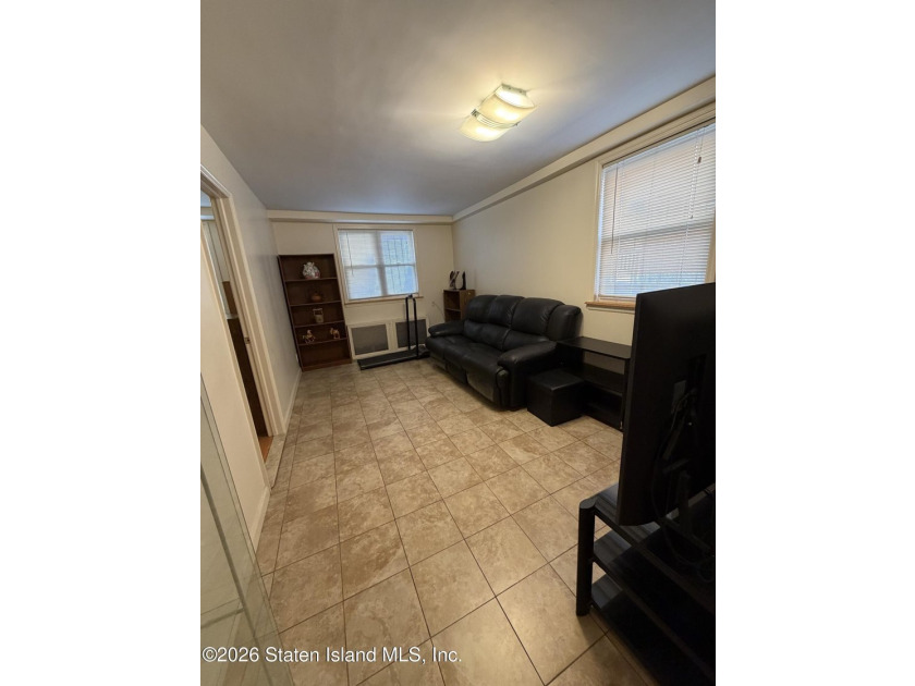 Welcome to 1066 East 100th Street, a well-maintained two-family - photo 8