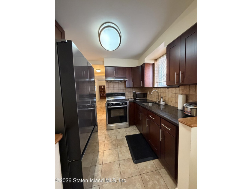Welcome to 1066 East 100th Street, a well-maintained two-family - photo 10