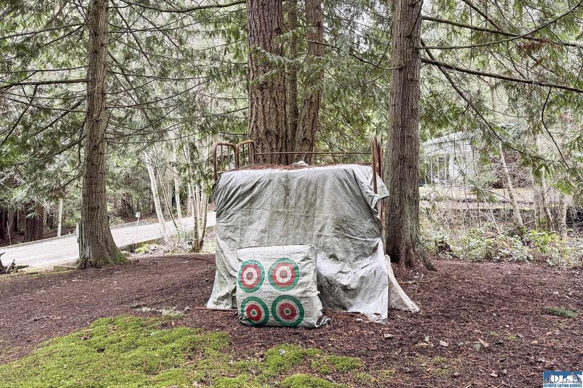 Welcome to Emerald Forest Ranch, a serene retreat tucked within - photo 38