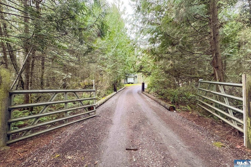 Welcome to Emerald Forest Ranch, a serene retreat tucked within - photo 50