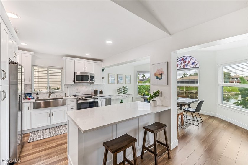Beautifully Renovated Waterfront Pool Home in Southwest Cape - photo 10