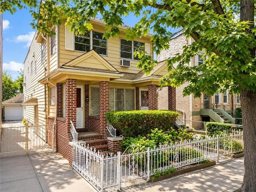 Fully detached two (2) family with private driveway in prime - photo 2