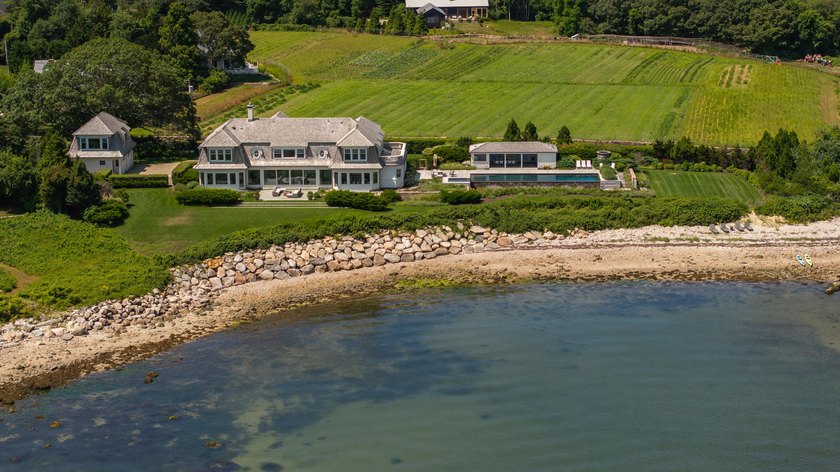 This sensational oceanfront estate is located in the coveted - photo 3