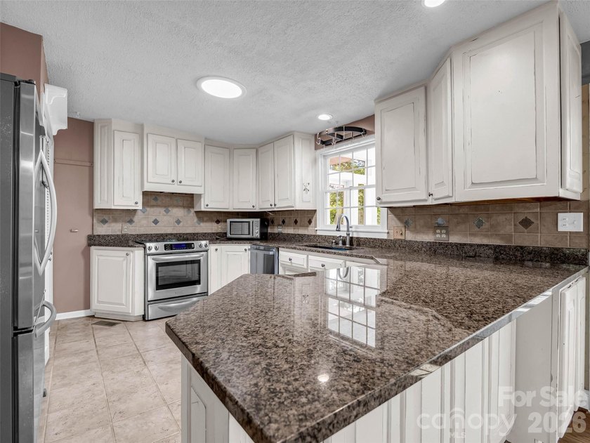 Discover unparalleled single-level living and privacy in the - photo 14
