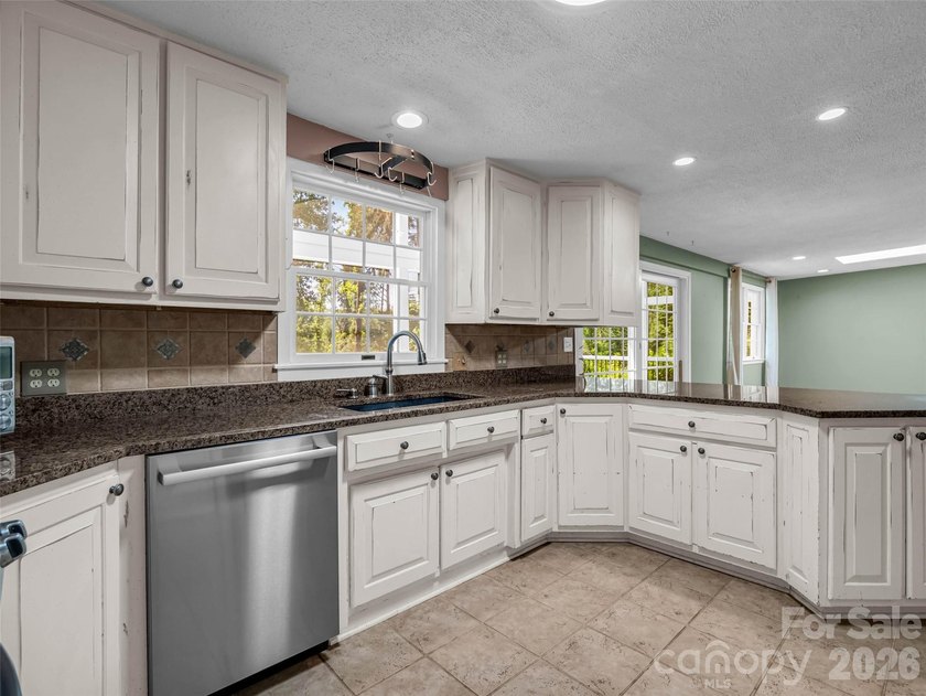 Discover unparalleled single-level living and privacy in the - photo 16